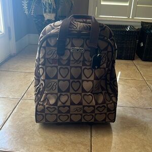 Looks new! Some scuffing on bottom and wheels.